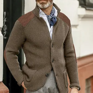Close-up detail of men's brown knit cardigan with stylish suede shoulder patches