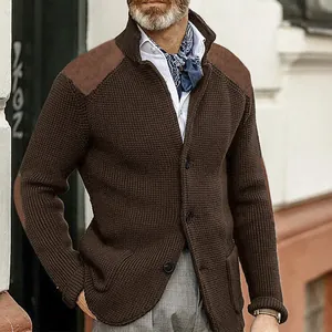Detailed close-up of a men's slim fit brown knit cardigan with suede shoulder patches