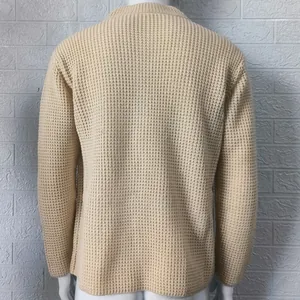 Back view of men's beige waffle knit cardigan showing detailed texture and slim fit.