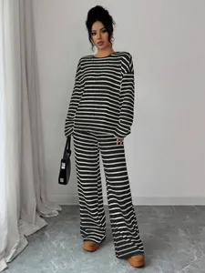Two-piece striped loungewear set featuring a crewneck long-sleeved top and wide-leg pants
