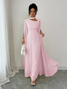 Elegant pink evening gown featuring cape sleeves and a choker neck detail for formal parties.