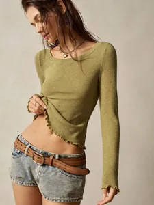 Close-up of olive green slim fit T-shirt featuring a delicate ruffled lettuce edge hem.