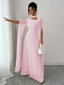 Elegant light pink floor-length evening dress featuring open cape sleeves and choker neck.