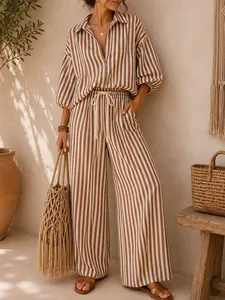 Stylish brown and white striped women's shirt and wide-leg pants set