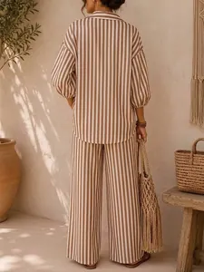 Back view of a chic brown and white striped shirt and wide-leg pants two-piece set.