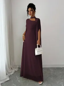 Elegant plum colored evening gown with unique cape sleeves and choker neck detail