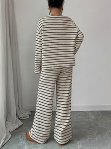Rear view detail of a loose striped long-sleeved loungewear set for women in beige