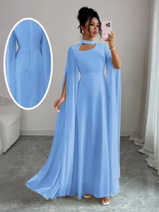 Elegant light blue maxi party dress with cape sleeves and cutout neckline detail.
