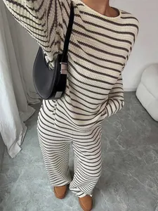 Detailed view of women's striped knit lounge set with textured fabric and relaxed fit