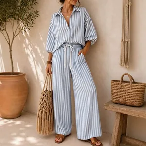 Elegant blue and white striped two-piece set featuring loose shirt and wide-leg pants