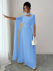 Elegant light blue maxi party dress with unique cloak sleeves and cutout neckline.