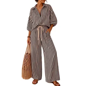 Stylish vertical striped women's two-piece set with long-sleeve shirt and wide-leg pants