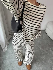 Detailed view of women's striped long-sleeve knit lounge set featuring textured waffle fabric