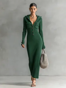 Dark green slim fit ribbed knit hooded dress featuring a half-button placket and chic hood