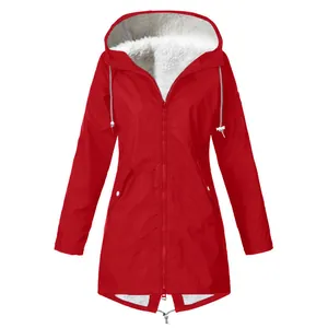 Detailed view of red waterproof jacket showing the warm thick white fleece lining