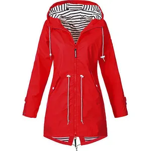 Detailed view of red hooded raincoat with striped lining and adjustable waist