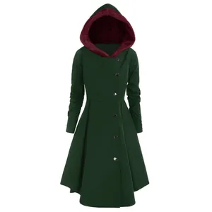 Detailed view of dark green vintage hooded coat with burgundy faux fur lining