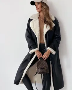 Modern black faux leather long coat featuring a warm white sherpa lining and collar