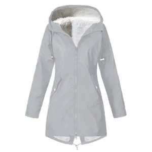 Detailed view of grey waterproof hooded jacket with soft white fleece lining