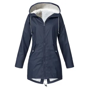 Full view detail of a navy blue waterproof jacket with warm white fleece lining inside