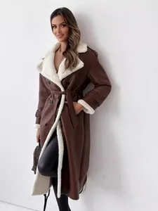 Long brown faux leather shearling coat with belt for winter Maillard style.