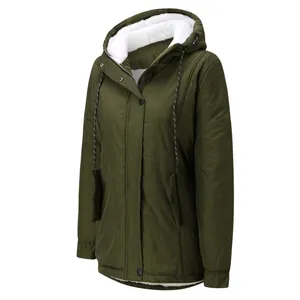 Detail of women's dark green fleece-lined hooded parka jacket for autumn winter.