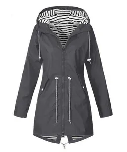 Women's lightweight dark gray hooded waterproof raincoat with striped lining detail.