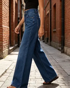 Side profile of women's dark blue wide-leg jeans highlighting the high-waisted fit and seams