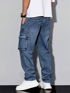 Back view detail of blue denim cargo pants for men with large side pockets and relaxed fit