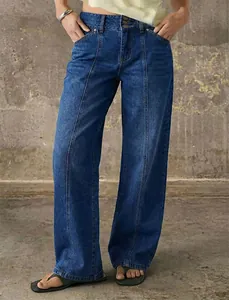 Wide-leg blue denim jeans for women featuring unique vertical seam detailing on front legs