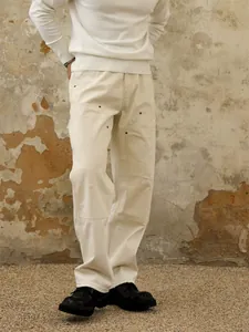 Pantalon large pour homme beige style American High Street avec double genouillères.