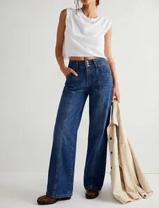 Detailed view of high-waisted dark blue straight-leg jeans with front seam