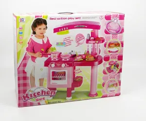 Detailed view of retail packaging for pink kids kitchen toy set with dimensions