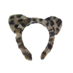 Detail view of a plush leopard print headband with cat ears for facial cleansing.