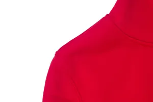 Close-up detail of red men's hoodie showing shoulder stitching and soft fleece texture