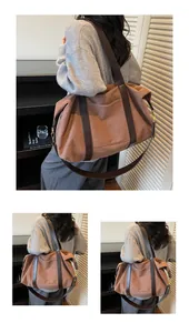 Vintage canvas travel bag being carried by a model in a cozy indoor setting