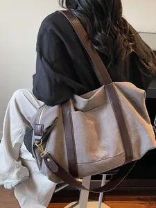 Large vintage canvas travel bag with spacious capacity for stylish daily commuting