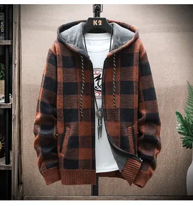 Detail of men's hooded plaid knit cardigan with soft lining and zipper closure.