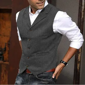 Professional detail shot of a men's grey herringbone tweed slim fit business waistcoat