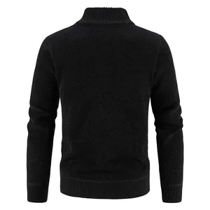 Rear view of men's black knitted cardigan sweater showing textured fabric detail