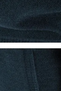 Macro view showing the soft integrated velvet lining of a men's knit jacket.
