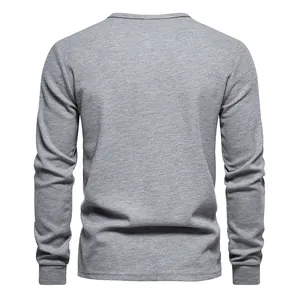 Detailed back view of a grey men's long-sleeve waffle knit t-shirt with classic texture