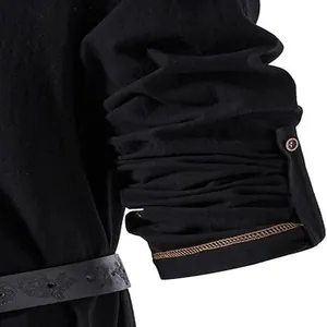 Close-up detail of black men's long sleeve Henley shirt with textured waist belt