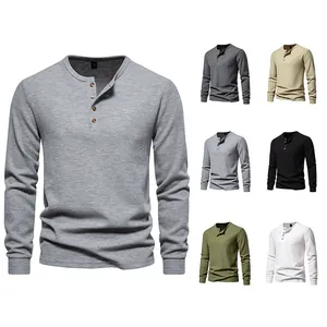 Classic men's long sleeve waffle knit henley shirt with a four-button placket design