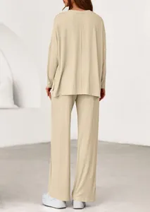 Back view of women's loose casual two-piece set with long sleeve top and pants