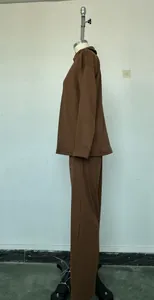 Elegant brown two-piece lounge set featuring a polo sweatshirt and wide-leg trousers