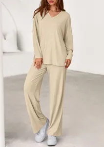 Detailed shot of comfortable beige long sleeve top and pants lounge set for women