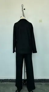Back view of women's black polo collar pullover and wide-leg pants two-piece set