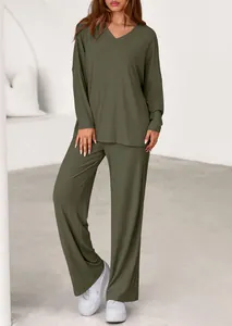 Detail view of olive green two-piece lounge set with V-neck top and wide-leg trousers