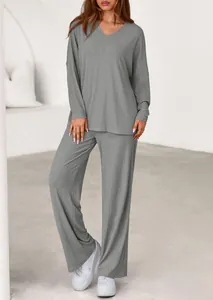 Comfortable women's grey 2-piece lounge set featuring a ribbed long sleeve top and pants